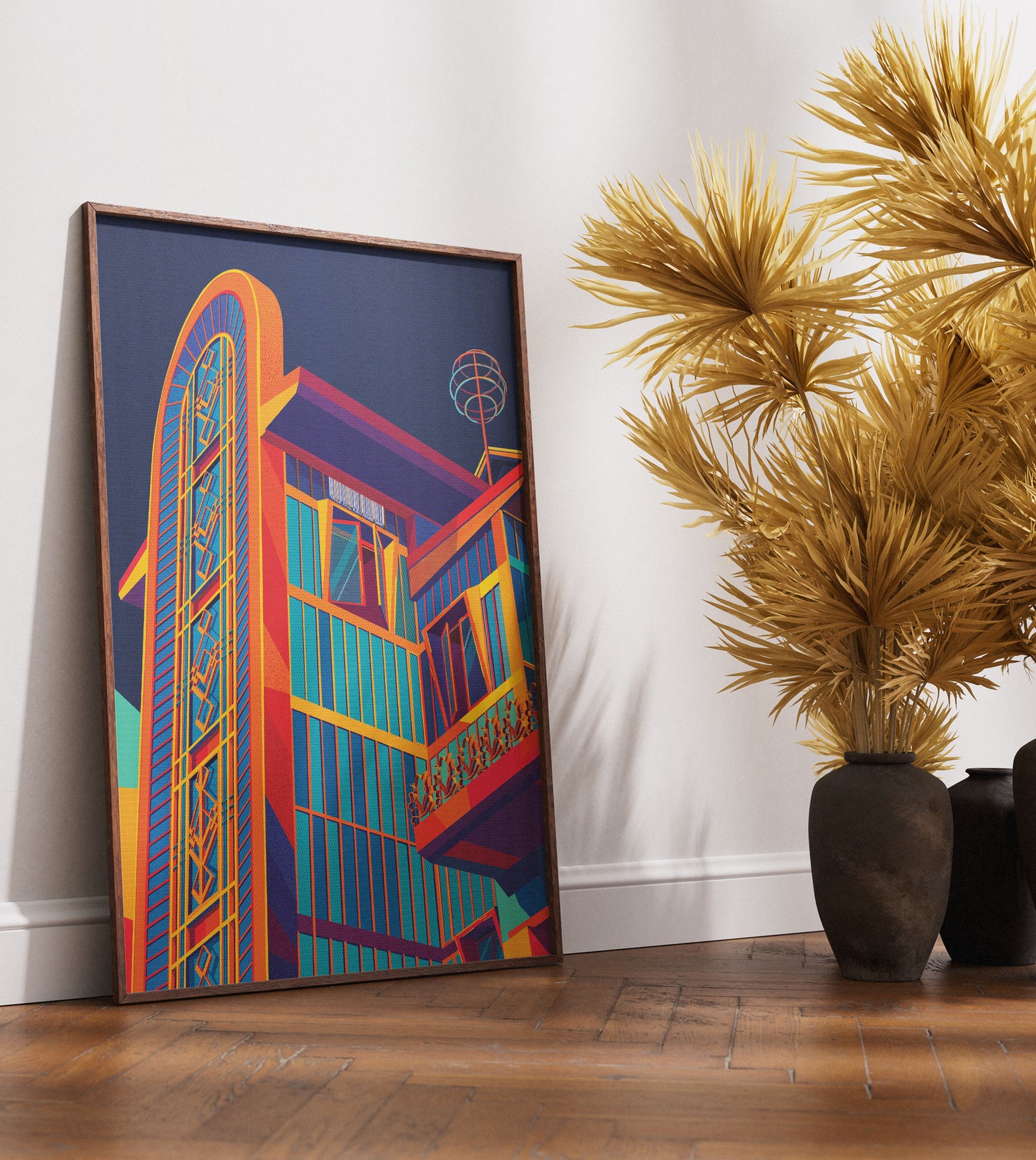 Colorful abstract painting of a building on a wall next to a potted plant.