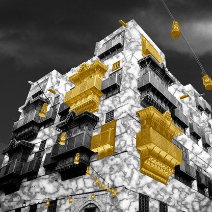 Building with gold and black architectural elements against a dark sky